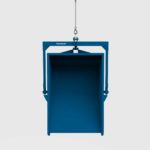small muck bin crane lifted and tipped front view