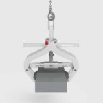 kerb lifter lifting a kerb stone front view