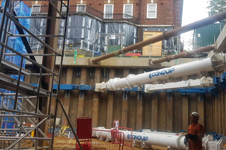 Ground level shot of Royal Brompton site excavation showing temporary outage propping system