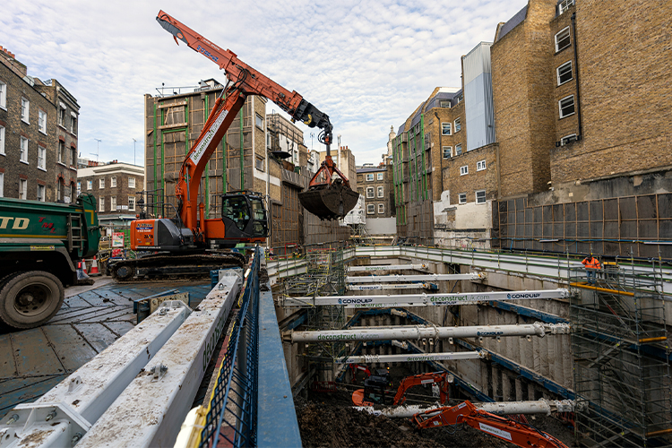 Excavator Gantry Platform with telescopic excavator and temporary propping at Cambridge House
