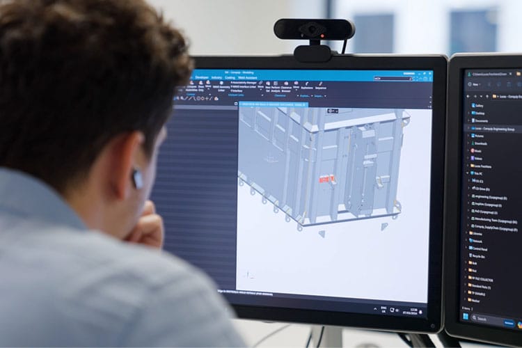 A man working on a computer designing a BulkX.