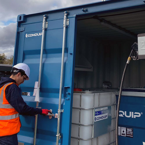 A man opening the Conquip Fuel Eco-Hub