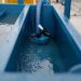 A Conquip Concrete Washout tray with waster for washing out concrete
