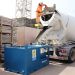 A Conquip Compact Concrete Washout Unit with a concrete truck pouring