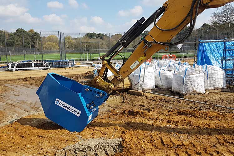 excavator pouring bucket attachment